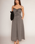 black and white Gingham printed midi dress
Sweetheart neckline
Adjustable shoulder straps and front bust tie
Smocked bodice
Flowy A-line skirt
Lined
spring midi dress