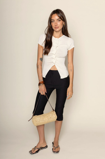 black Slim fit capri pants
Functional belt loops
Functional side pockets
Faux back welt pockets
Side slits at calves
Concealed front zipper with hook closure
european summer capri pants