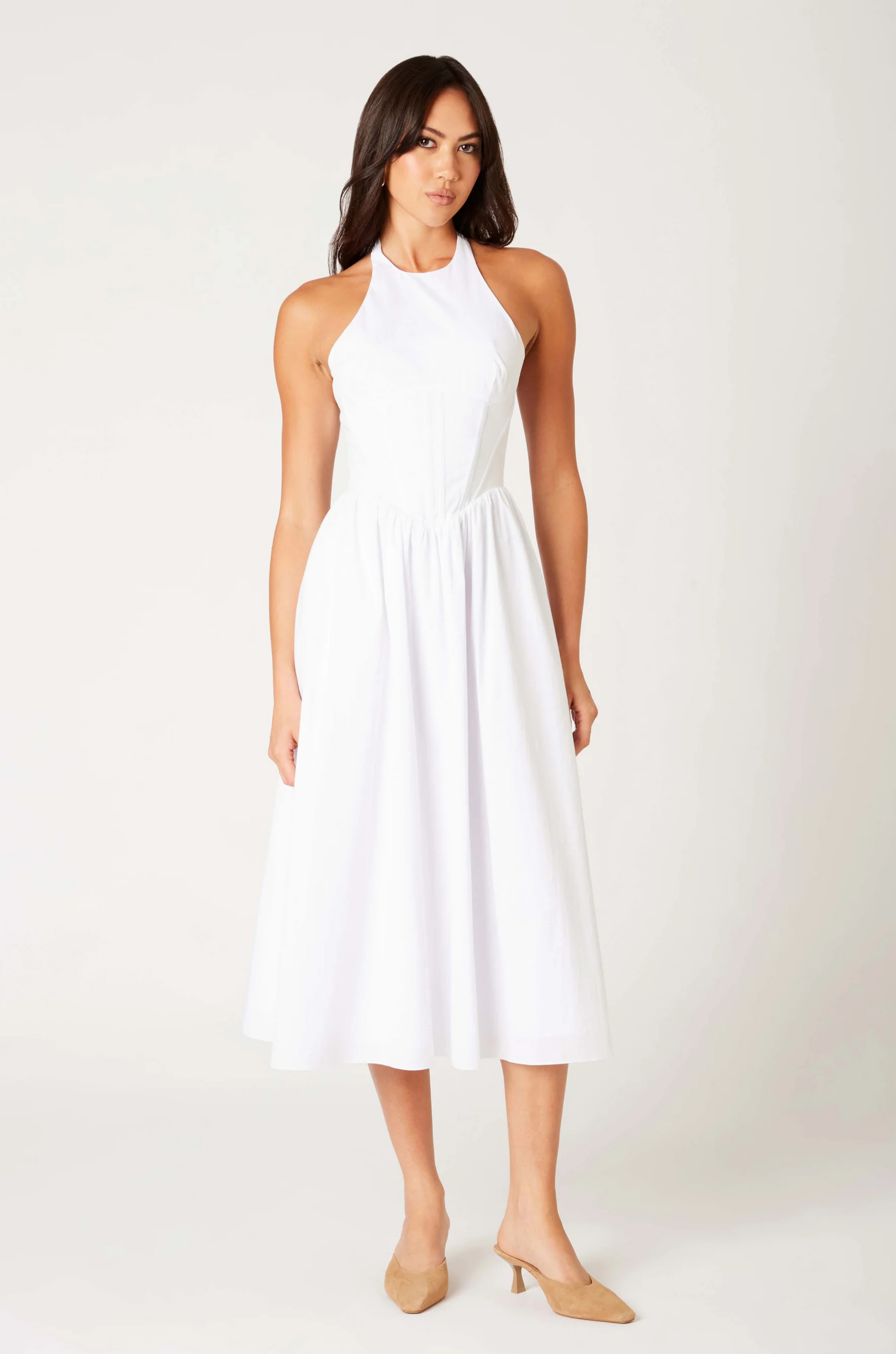 Woven midi dress
Adjustable halter neckline
Boning in bodice
Side pockets
Elastic back neckline
Back hook and eye and zipper closures
Fully lined
white midi dress
bridal dress
bridal shower dress