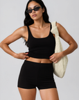 Ribbed knit tank top. Elastic neckline. Unlined. Basic tank top. black tank top. basic black tank top