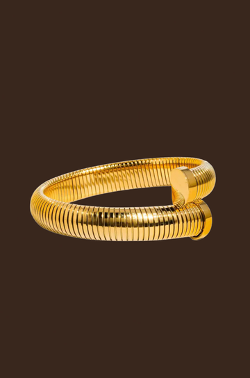 18K Gold Non-Tarnish Bold Bangle
18K Gold Plating
Stainless Steel
Inner Diameter: 2.75" / Thickness: 0.4"
Lead-free
Nickel-safe
Hypoallergenic
Water Resistant
gold asymmetrical bangle bracelet