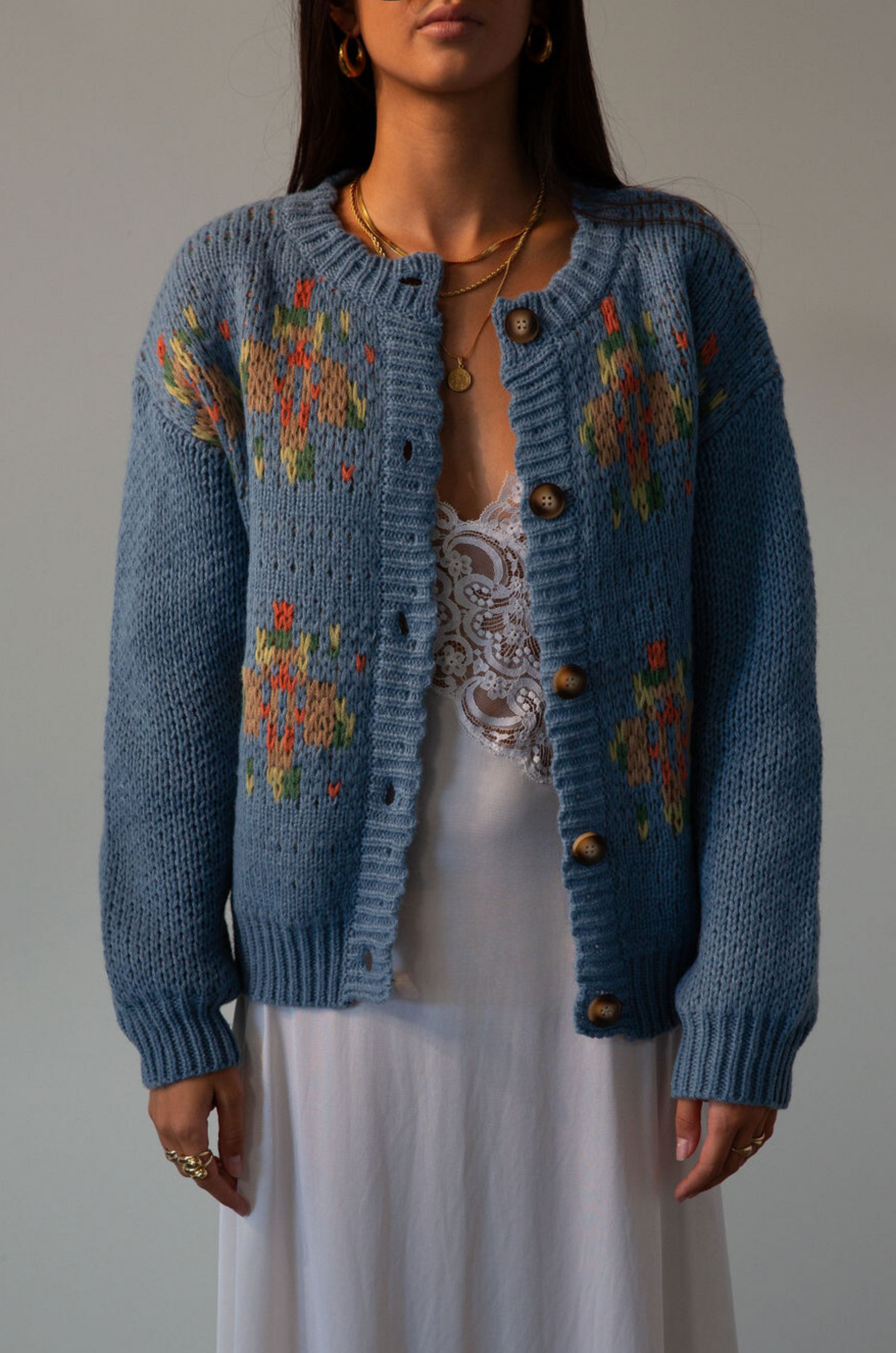 Crochet knit cardigan. Front button down closure. blue sweater cardigan. fall outfit. blue cardigan. blue sweater cardigan. grandma looking sweater