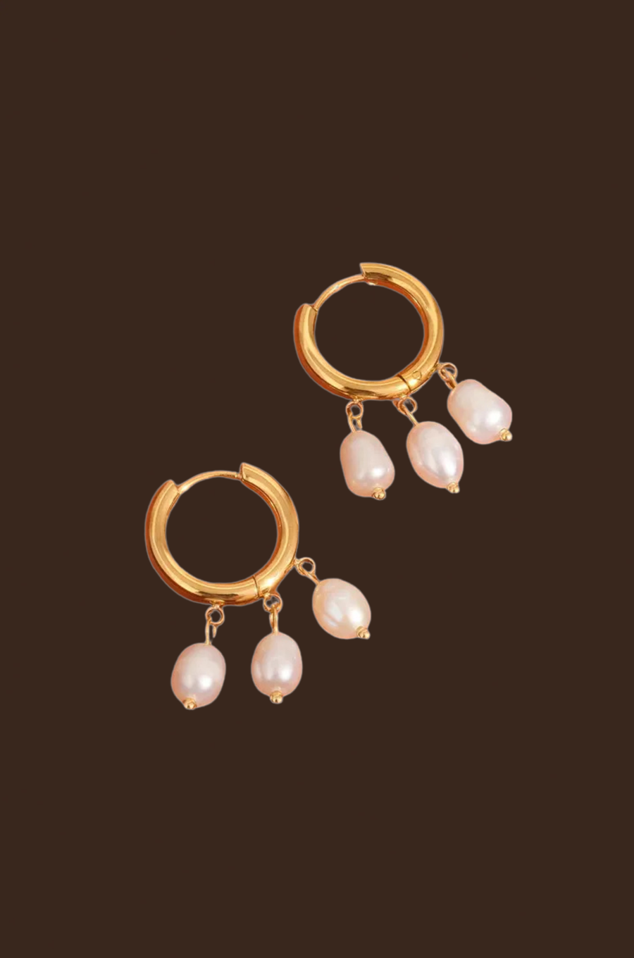 18K Gold Non-Tarnish Three Petite Pearl Dangle Earring
18K Gold Plating
Stainless Steel
Freshwater Pearl
Measurement (L x W inch): 1.1 x 0.5
Lead-free
Nickel-safe
Hypoallergenic
Water Resistant