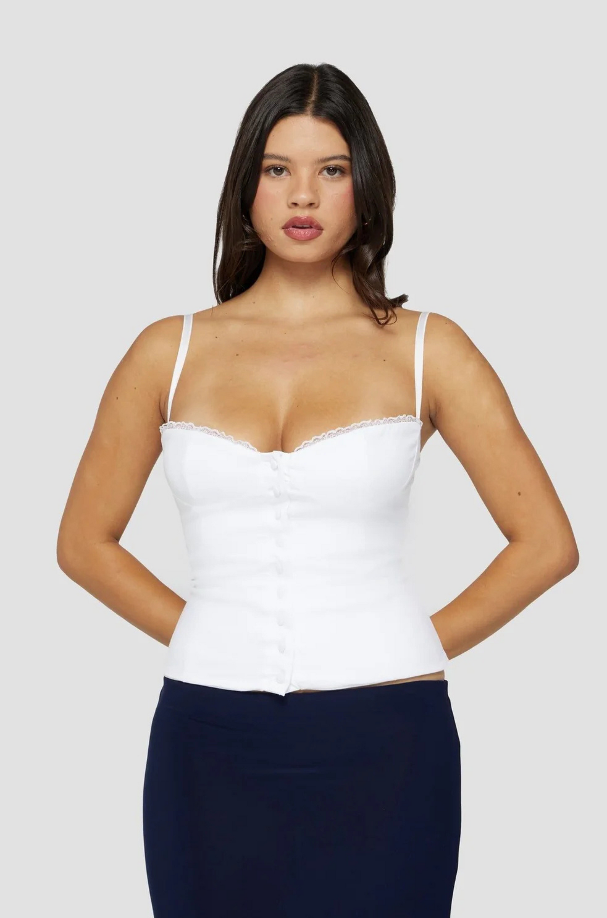 Knit crop top corset
Adjustable velvet straps
Tulle trimmed neckline
Front hook and eye closures
Fully lined
white corset tank top
white going out top
bridal outfit
bachelorette outfit
