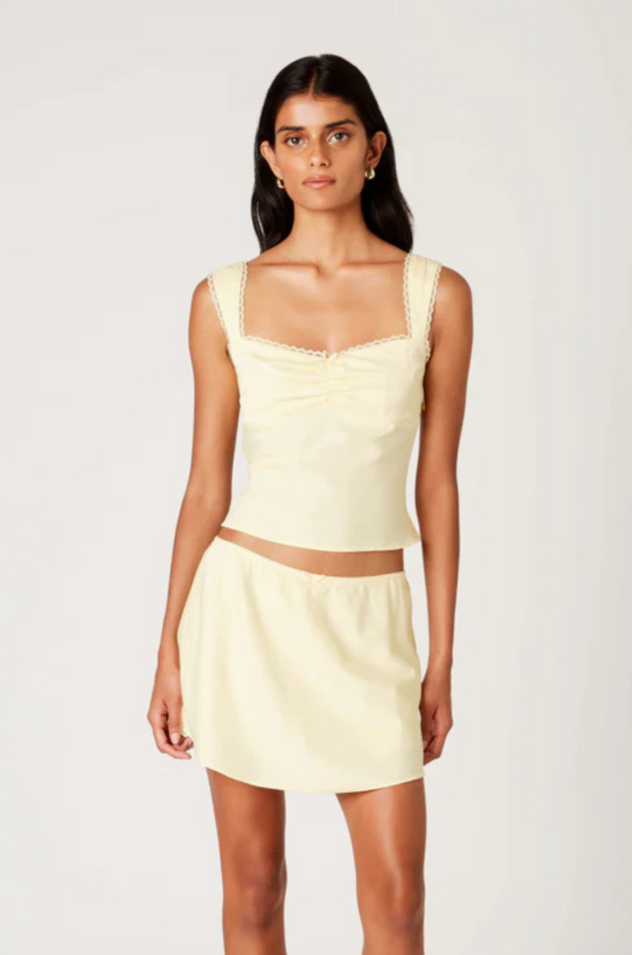 yellow satin tank top
Sweetheart neckline with ruched bust
Wide fixed shoulder straps with lace trim
Adjustable tie-back detail
Fitted silhouette
Unlined
summer tank top
spring tank top