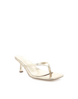 Xami is the perfect casual thong heel that will get you from work to the weekend. This on-trend style will be the perfect addition to your wardrobe.

low kicked-in stiletto heel
open square toe
thin thong toe straps
easy slip on design
open heel counter
synthetic upper, lining and outsole
Heel height: 2.56"
Synthetic
gold kitten heel
gold thong kitten keel