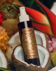A bottle of Vacation 15 Original Coconut Oil body spray 