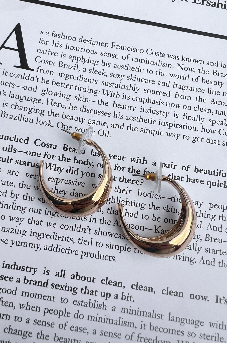 Open hoop gold earrings Post back.