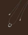 Rope necklace with horseshoe pendent
Adjustable
