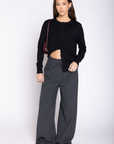 Knit long sleeve cardigan
Front button down closure
Ribbed crewneck neckline
Unlined
black cardigan