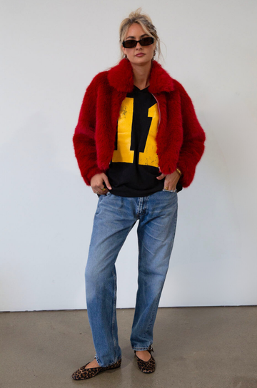 Faux fur coat. Collar neckline. Front zipper closure. Side pockets. Fully lined. red fur coat. fall coat. winter coat. red faux fur coat
