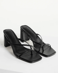 black Cross over strap heels
Squared toe
Block heel