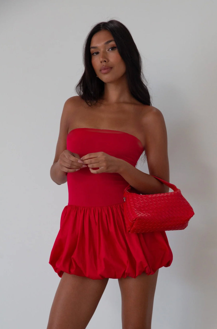 Sleeveless dress. Knit bodice. Woven bubble skirt. Elastic hem. Fully lined. red bubble dress. red mini dress. red mini bubble dress. summer dress. going out dress