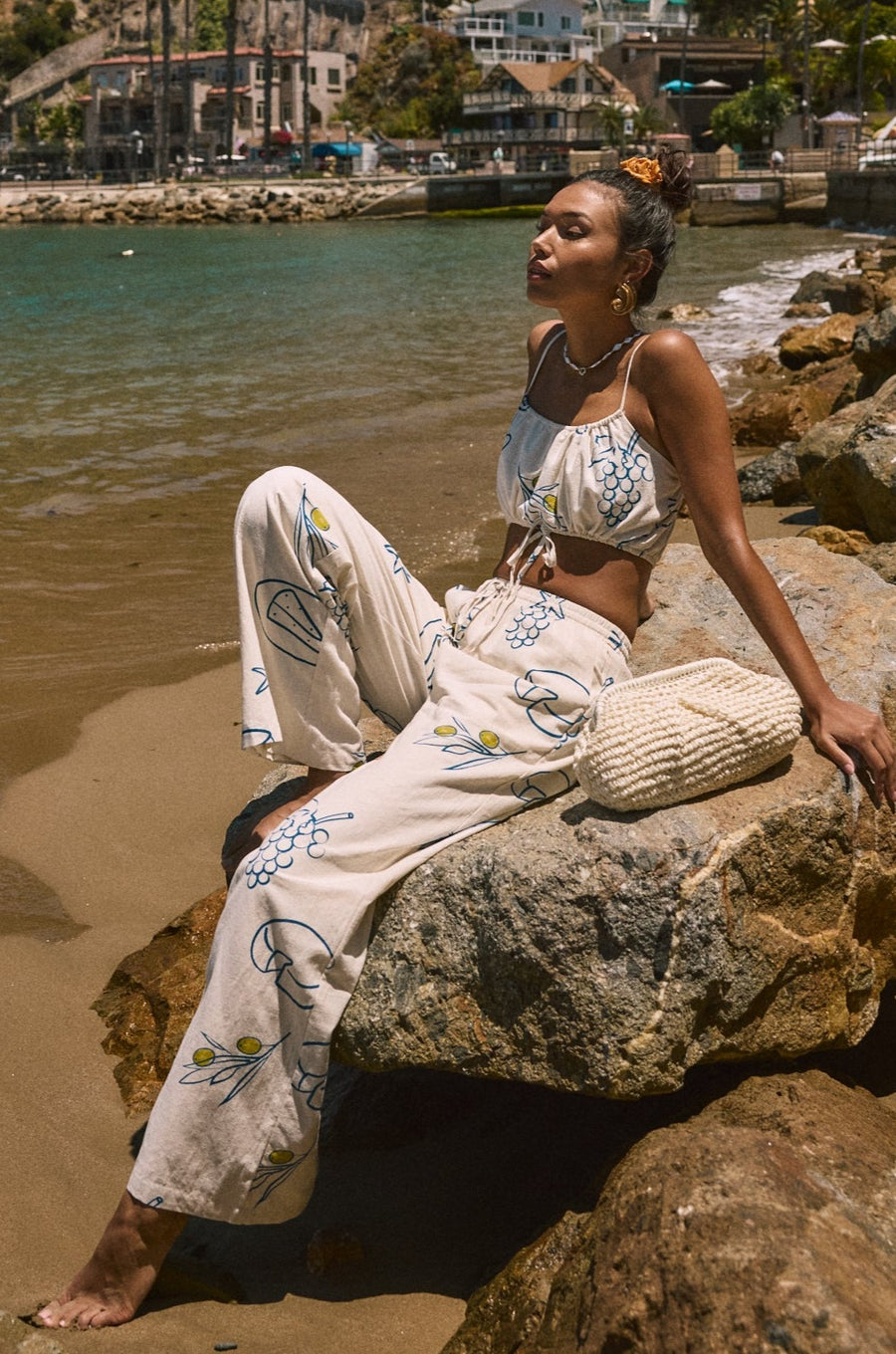 Printed woven wide leg pants. Elastic waistband with drawstring closure. Side pockets. Fully lined. lemon pant. grape and wine pant. summer throw on pant. cute graphic linen pant. european summer pant. summer pant. vacation outfit. cute summer set.