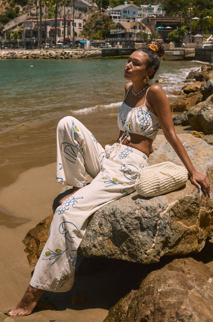 Printed woven wide leg pants. Elastic waistband with drawstring closure. Side pockets. Fully lined. lemon pant. grape and wine pant. summer throw on pant. cute graphic linen pant. european summer pant. summer pant. vacation outfit. cute summer set.