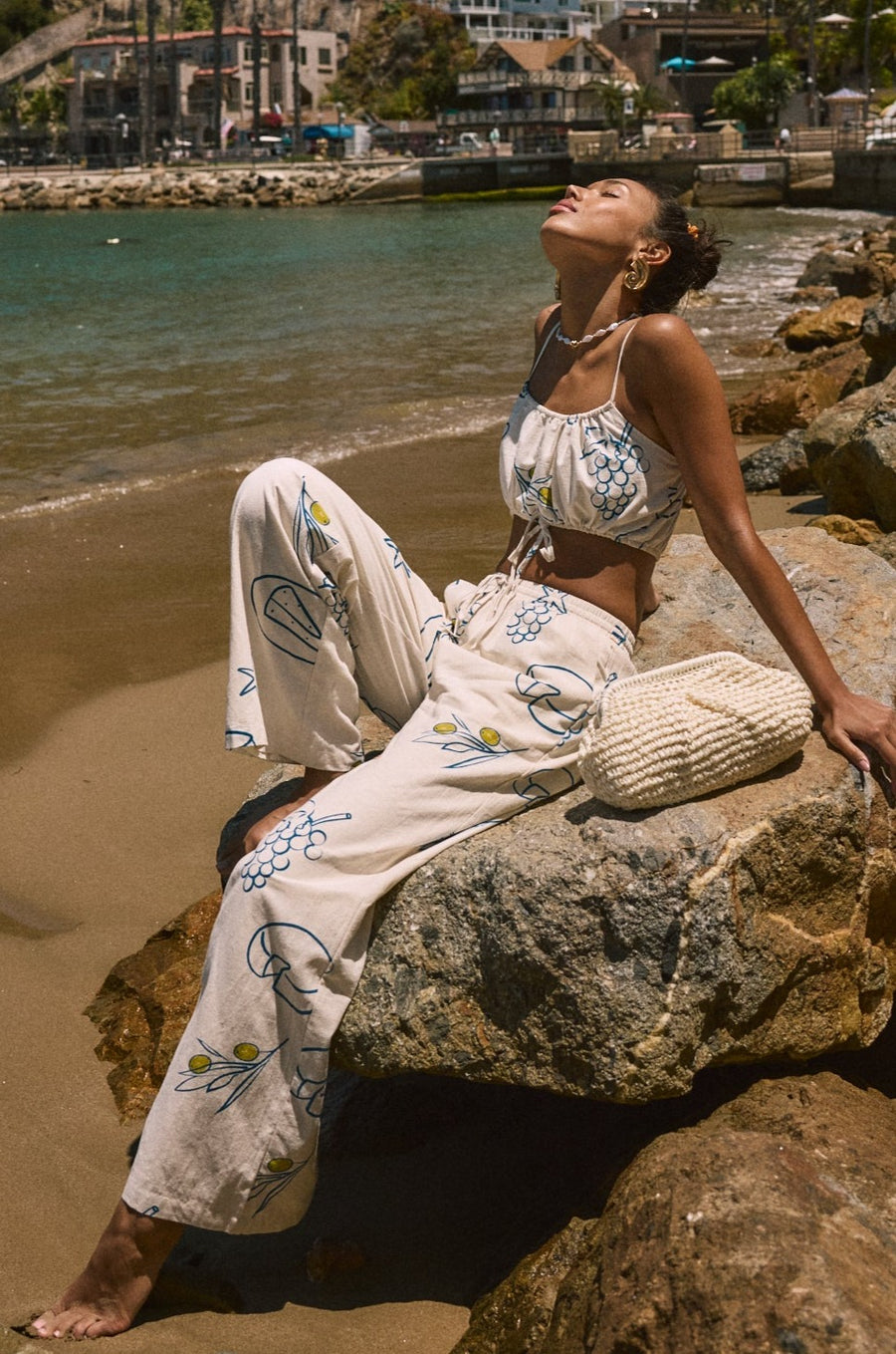 Printed woven wide leg pants. Elastic waistband with drawstring closure. Side pockets. Fully lined. lemon pant. grape and wine pant. summer throw on pant. cute graphic linen pant. european summer pant. summer pant. vacation outfit. cute summer set.