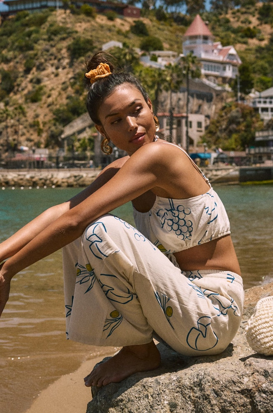 Printed woven cropped tank top. Adjustable straps. Drawstring hem. Elastic back. Fully lined. lemon top. lemon shirt. summer crop tank top. cute graphic tank top. european summer top. summer top. vacation outfit. cute summer set.