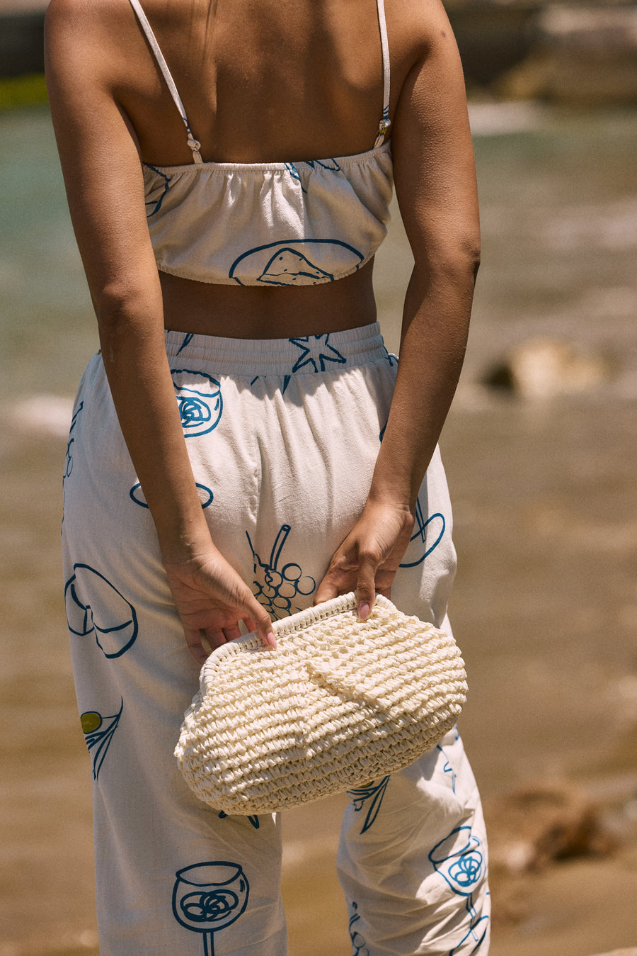 Printed woven wide leg pants. Elastic waistband with drawstring closure. Side pockets. Fully lined. lemon pant. grape and wine pant. summer throw on pant. cute graphic linen pant. european summer pant. summer pant. vacation outfit. cute summer set.