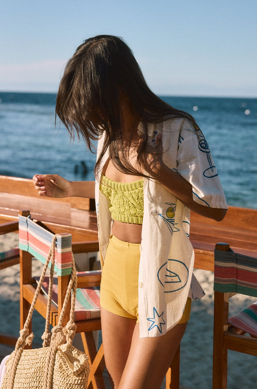 Printed woven shirt. Collar neckline. Short sleeves. Front button down closures. Front pocket. Unlined. shirt with wine on it. shirt with lemon. shirt with grapes. beach cover up. beack top cover up. summer top. vacation top. vacation outfit. european summer top. european summer outfit. european summer outfit inspo