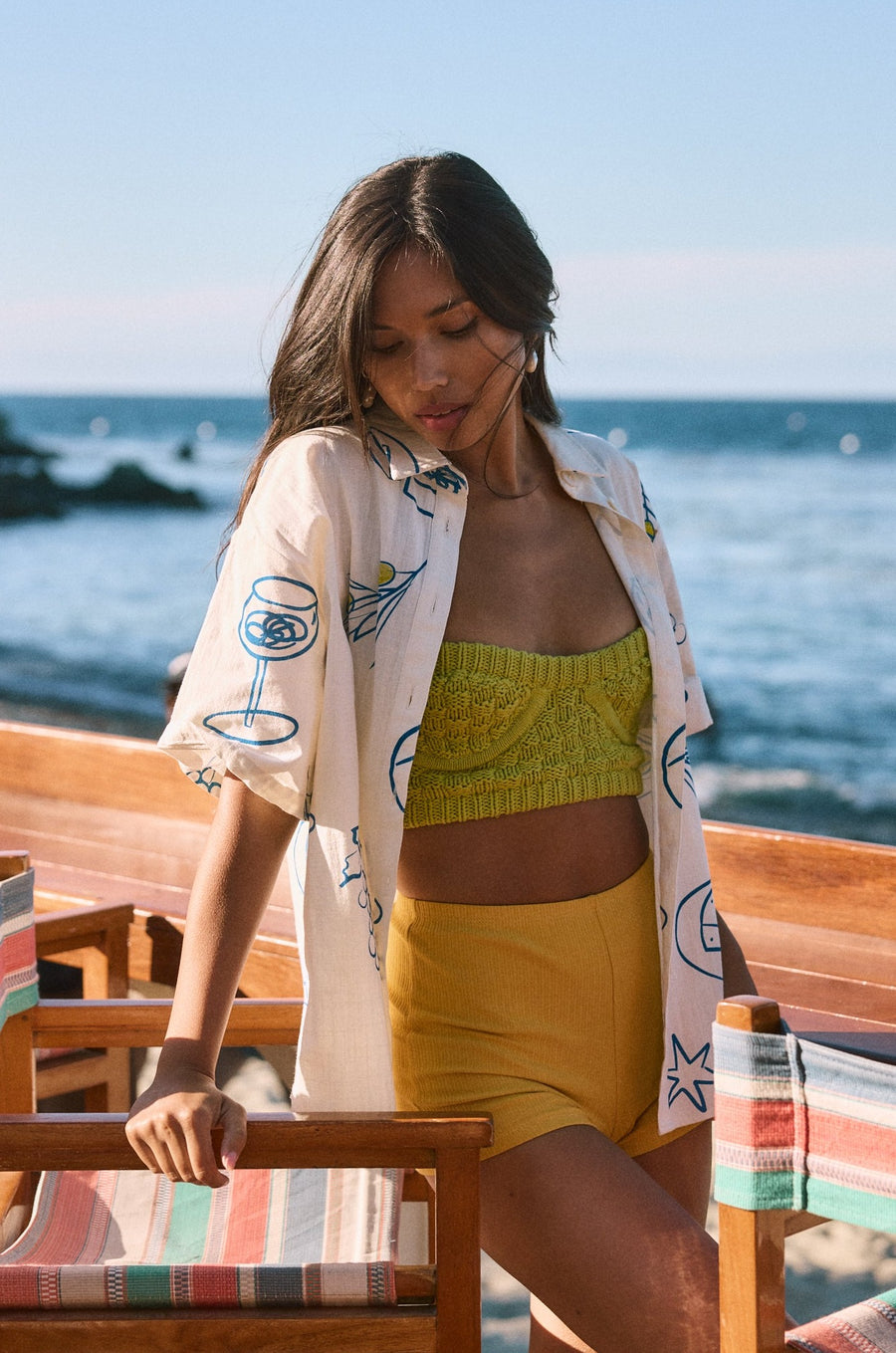 Printed woven shirt. Collar neckline. Short sleeves. Front button down closures. Front pocket. Unlined. shirt with wine on it. shirt with lemon. shirt with grapes. beach cover up. beack top cover up. summer top. vacation top. vacation outfit. european summer top. european summer outfit. european summer outfit inspo