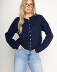 Knit long sleeve cardigan
Rolled collar
Button down closure
navy blue cardigan
fall cardigan
fall outfit
fall sweater