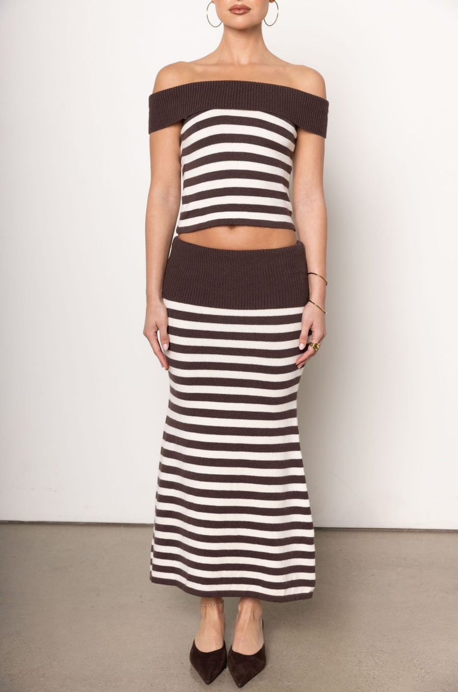striped set
Brown and white striped maxi skirt
brown and white skirt set
fall set
fall outfit
Striped knit top
Off the shoulder fold over
Sleeveless
Unlined
Length: 24"
Viscose/Nylon/Polyester
Striped knit A line maxi skirt
Fold over waistband
Unlined
Length: 32"
Viscose/Nylon/Polyester