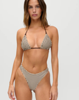 Exclusively from the JENNIE x Frankies Bikinis collaboration.
Skimpy triangle bikini
Reversible design: animal print on one side, striped print on the other
Double loop straps
Adjustable halter neck and back ties
Satin shine swim fabric
Nylon/Spandex
animal printed with a reversible striped bikini top