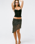 Polka dot mini skirt
Asymmetrical hemline
Side zipper closure
Partially lined/Partially sheer
black and white polka dot mini skirt
black and white polka dot midi skirt
