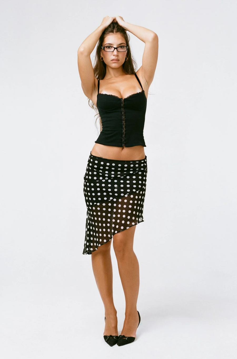 Polka dot mini skirt
Asymmetrical hemline
Side zipper closure
Partially lined/Partially sheer
black and white polka dot mini skirt
black and white polka dot midi skirt