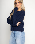Knit long sleeve cardigan
Rolled collar
Button down closure
navy blue cardigan
fall cardigan
fall outfit
fall sweater