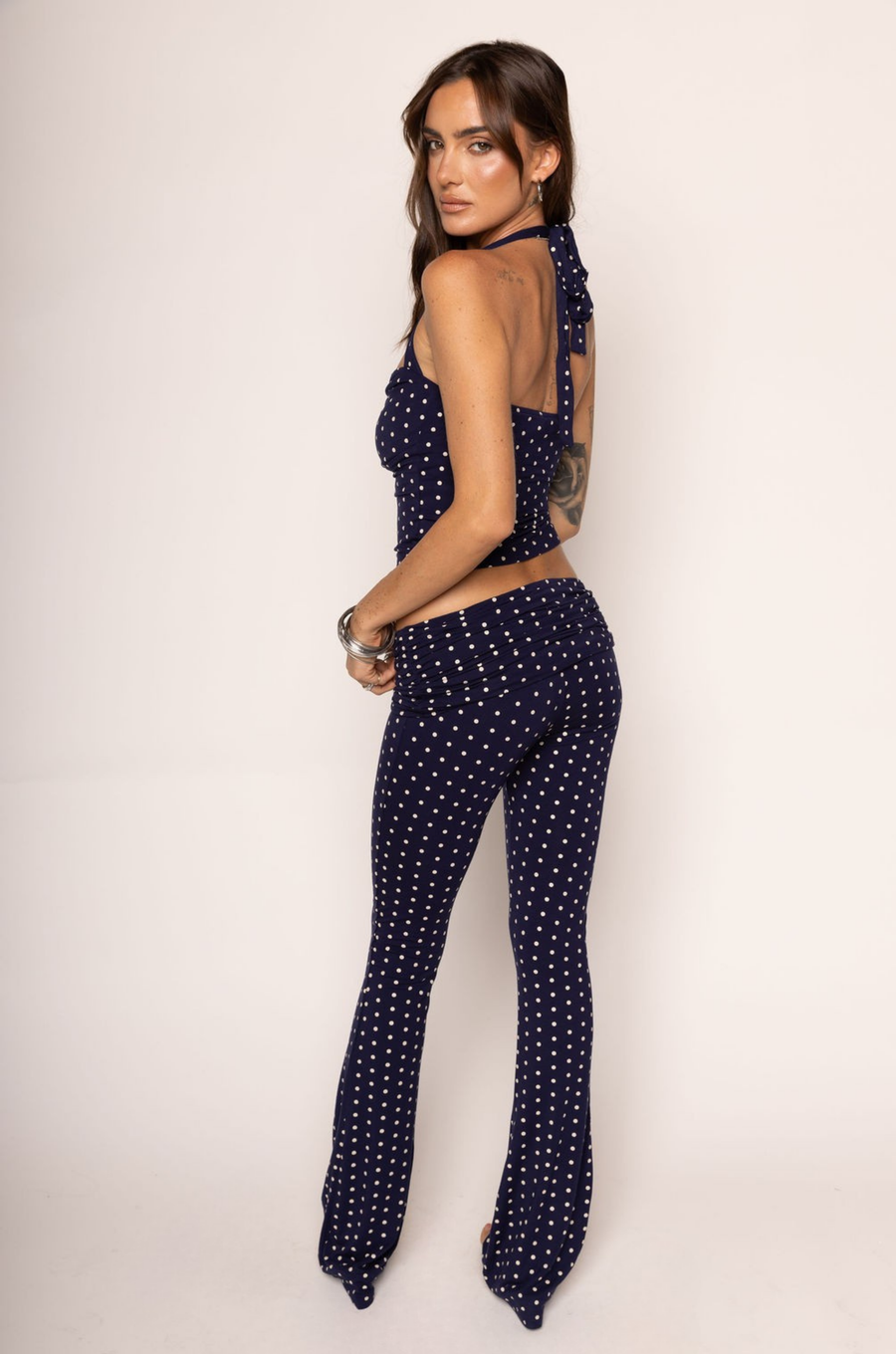 navy and white polka dot halter top with adjustable neck tie

navy and white fold over stretchy pants