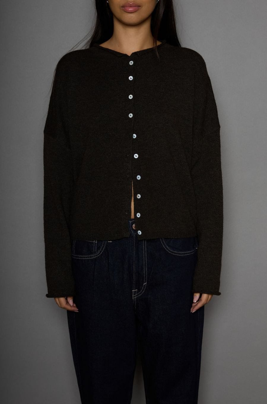 Fuzzy knit cardigan. Crewneck. Front button down closures. Long sleeves. Unlined. brown cardigan. fall outfit. fall cardigan. layering piece. layering cardigan