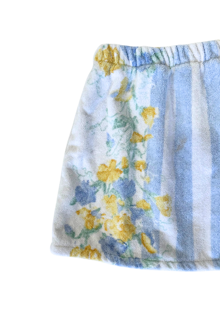 blue and yellow Striped and floral printed towel skirt
Elastic waistband
Unlined
Up-cycled
Each towel is up-cycled - there may be imperfections