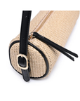 Cylindrical woven straw shoulder bag
Zipper closure
Slim strap
Lined
Vegan Leather
beige woven barrel bag