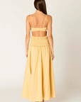 yellow Smocked maxi dress
Straight neckline
Adjustable spaghetti straps
Gathered bust with tiered smocking
Back cutout detail
Side pockets
Fully lined