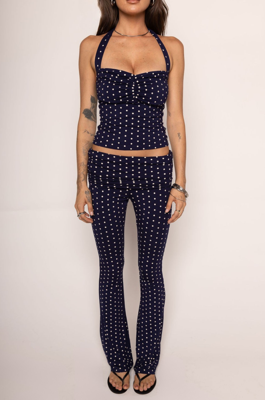 navy and white polka dot halter top with adjustable neck tie

navy and white fold over stretchy pants
