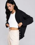 Fuzzy knit cardigan
Crewneck
Front button down closures
Long sleeves
Unlined
black basic cardigan
fall cardigan
fall sweater
fall outfit