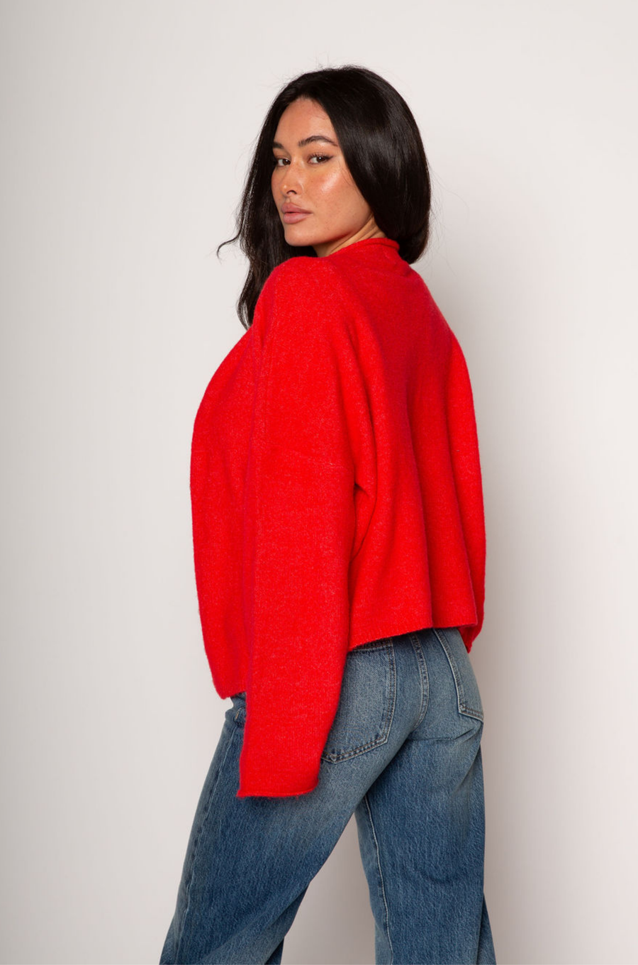 red Fuzzy knit oversized cardigan. Crewneck. Front button down closures. Long sleeves. Unlined.