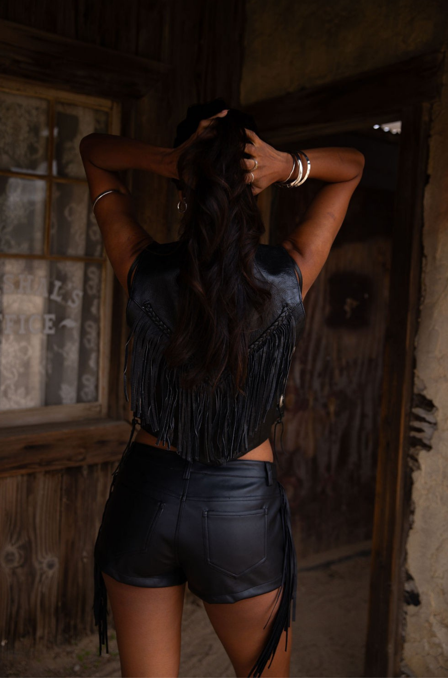black Faux leather fringe mini shorts
Side fringe
5 pocket construction
Zipper and fly closure
Belt loops
Unlined
Coachella outfit
Stagecoach outfit
Festival outfit