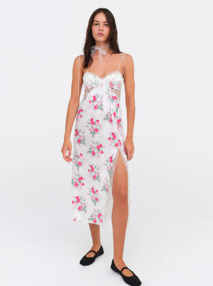 Floral printed satin maxi dress. Adjustable tie straps. Front slot. Adjustable back tie closures. Unlined for love and lemons dress. floral slip dress with lace detail and slit.