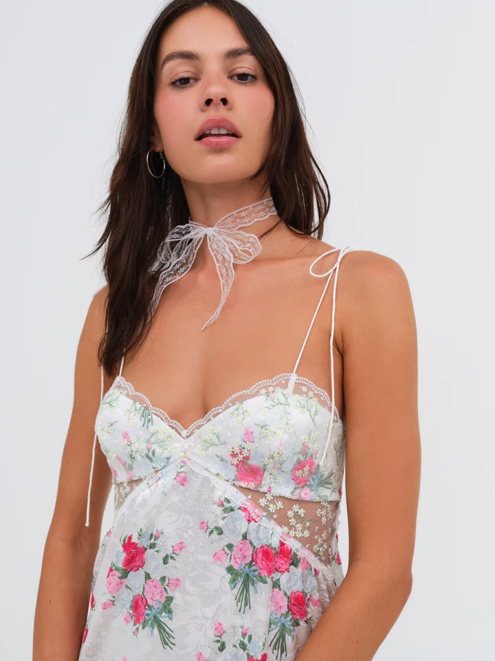 Floral printed satin maxi dress. Adjustable tie straps. Front slot. Adjustable back tie closures. Unlined for love and lemons dress. floral slip dress with lace detail and slit.