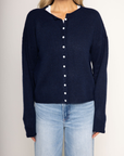 Knit long sleeve cardigan
Rolled collar
Button down closure
navy blue cardigan
fall cardigan
fall outfit
fall sweater
