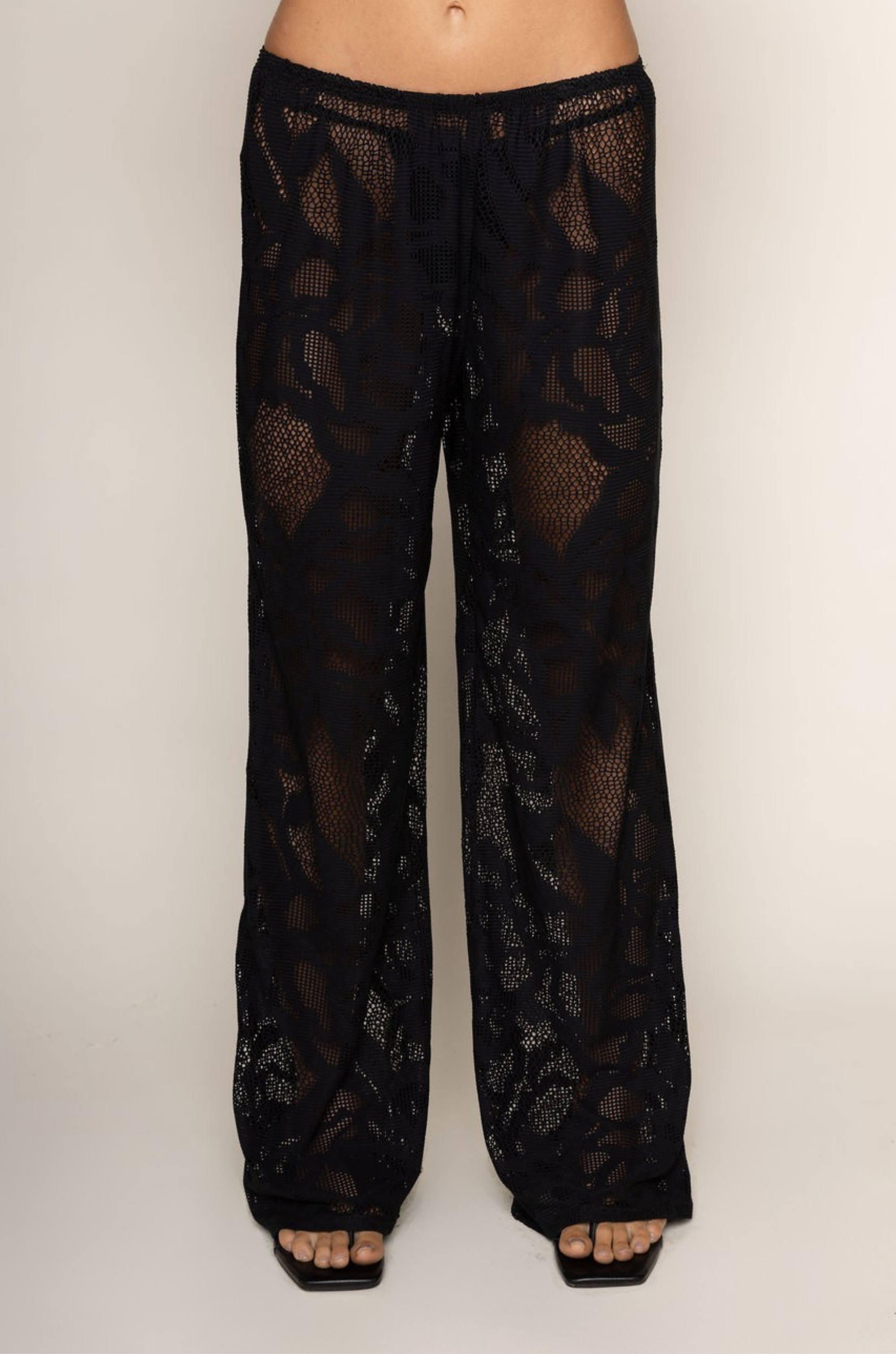 black Open knit lace cover up pants
Elastic waistband
Unlined/sheer