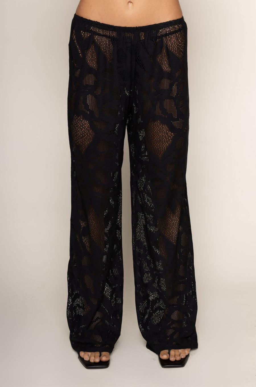 black Open knit lace cover up pants
Elastic waistband
Unlined/sheer