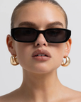 Sleek rectangular sunglasses
Featuring a structured silhouette with a bold frame and tonal lenses
Chunky acetate frame
Wide temples (arms) for a bold finish
Scratch resistant lenses
black rectangle sunglasses