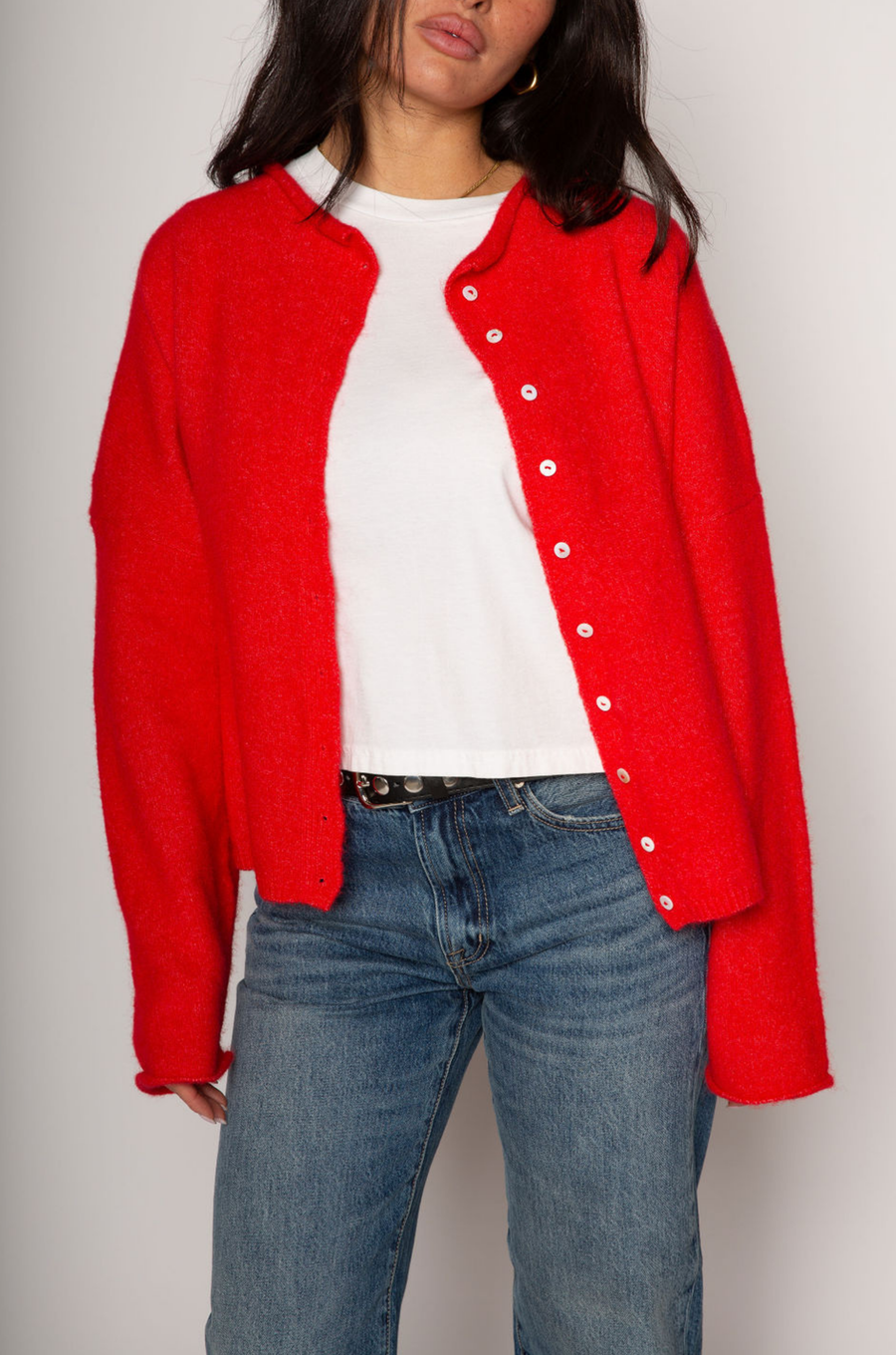 red Fuzzy knit oversized cardigan. Crewneck. Front button down closures. Long sleeves. Unlined.