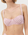 pink Striped unlined bra
Underwire cups
Adorned with picot trims
Decorative bow at front
Adjustable straps
pink bra
for love & lemons bra