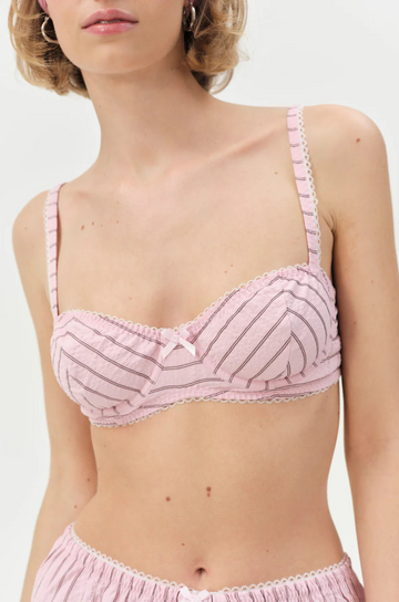 pink Striped unlined bra
Underwire cups
Adorned with picot trims
Decorative bow at front
Adjustable straps
pink bra
for love & lemons bra