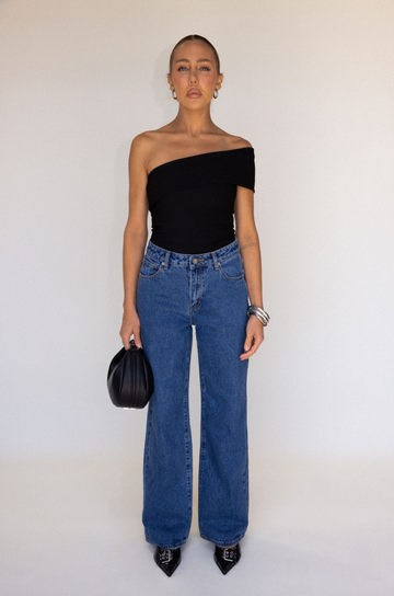 black Ribbed bodysuit
One shoulder neckline
Snap bottom closures
Thong back
Unlined
going out top