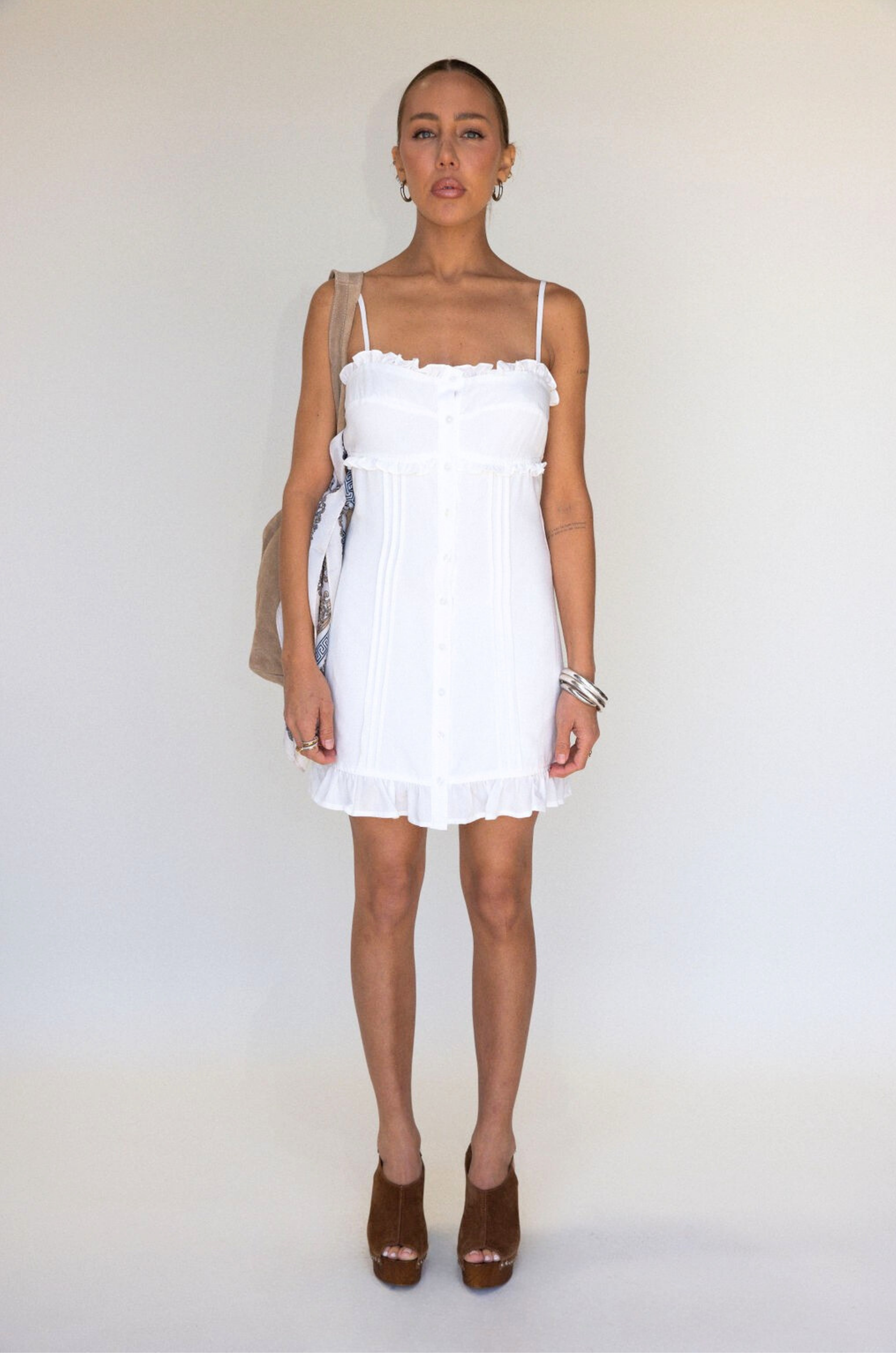 white Woven cami mini dress
Button down closure
Adjustable straps
Ruffled trim
Lined
bridal dress outfit
bachelorette 
white mini dress
summer dress
spring dress